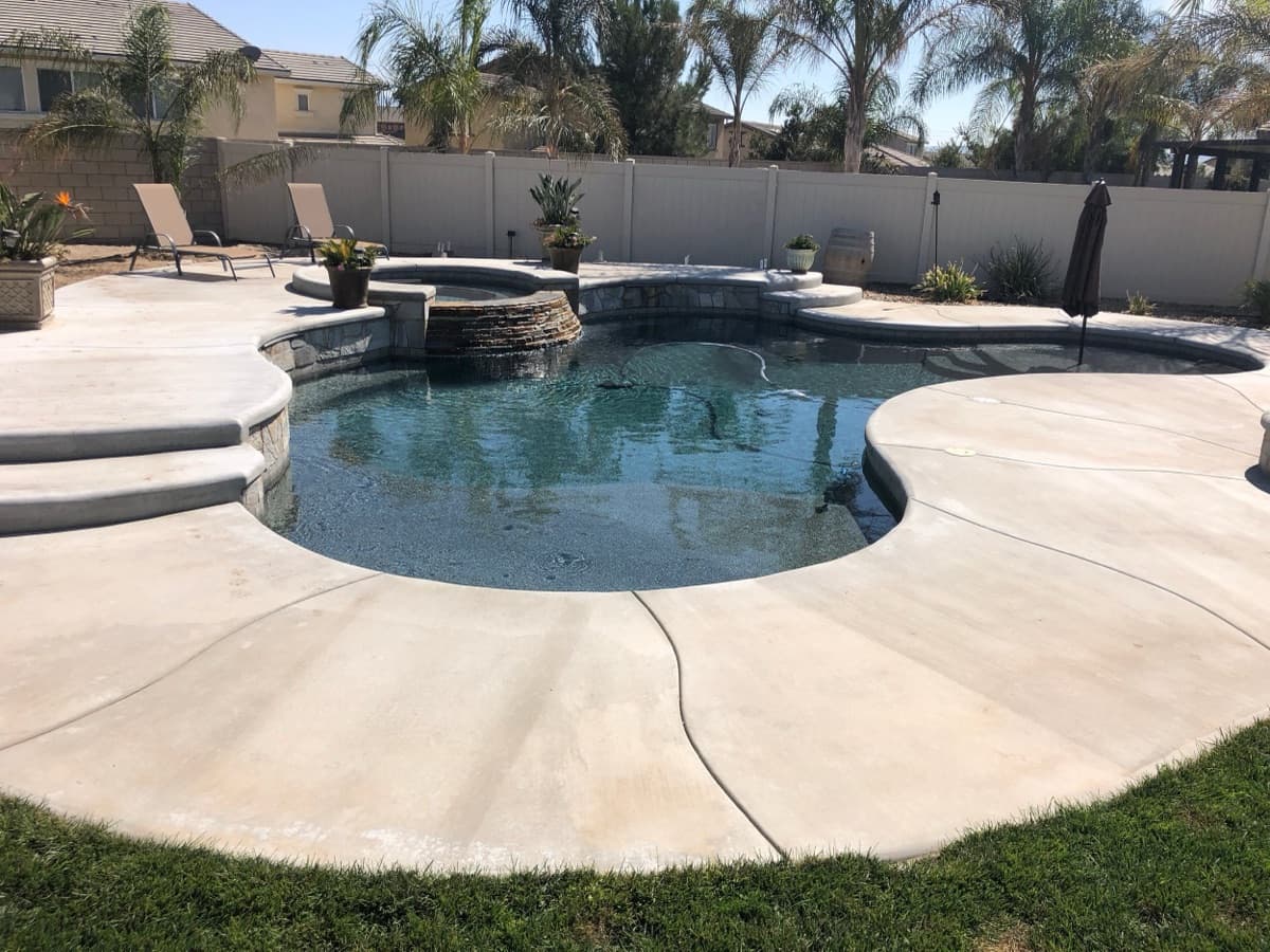 Tasteful Stone - Custom pool by Bogner Pools Riverside